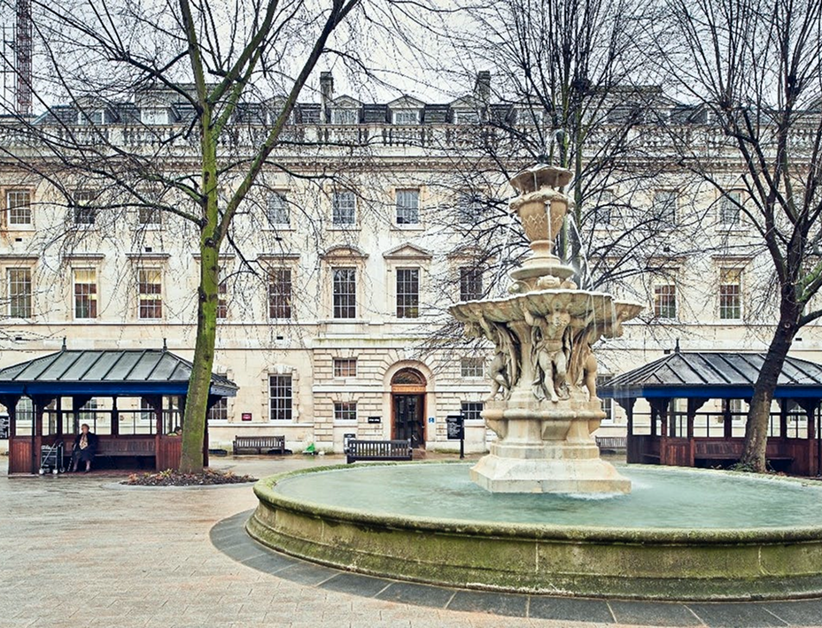 St Bartholomew's Hospital building with fountain